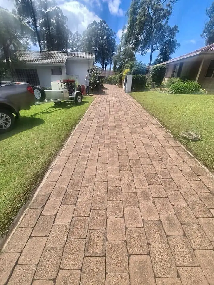After: paver driveway cleaned by JKS